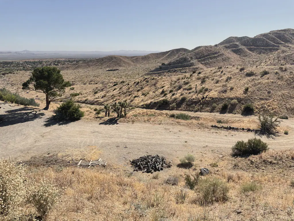 The fire pit above the valley, with the hills beyond